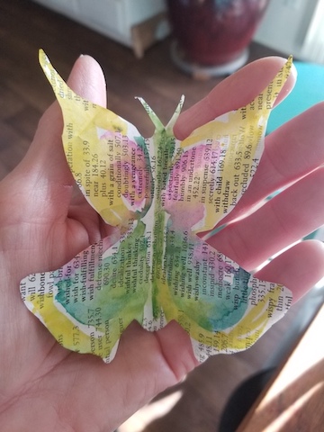 a colorful butterfly with text